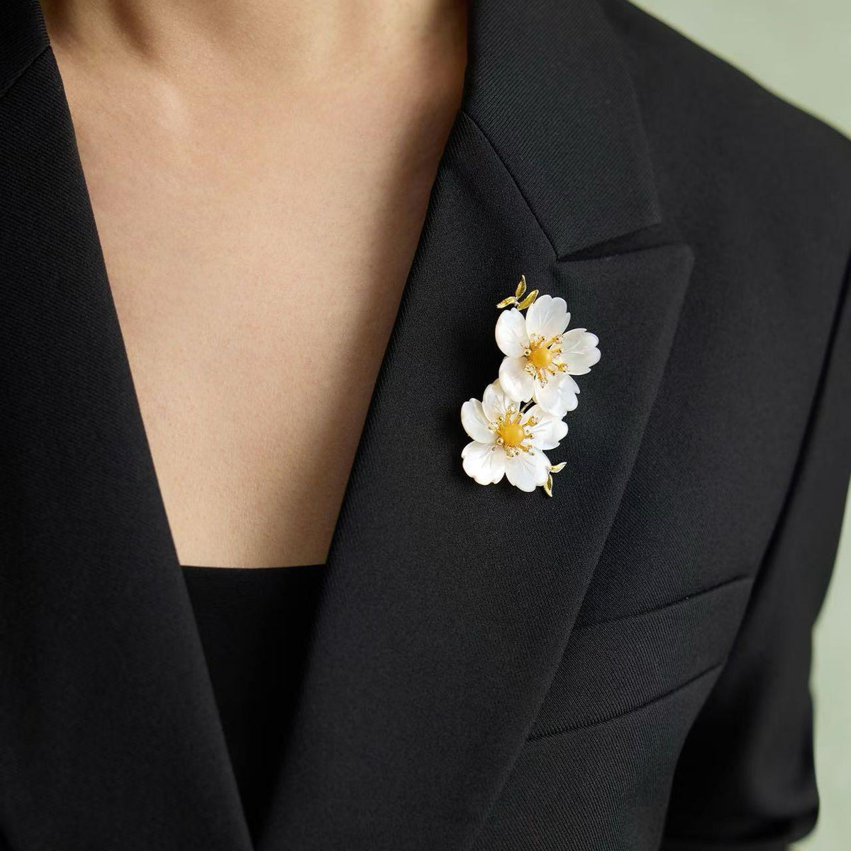 Morado copper-gilt twin-flower brooch adorned with amber, pearl, and mother-of-pearl • Multi-wear design